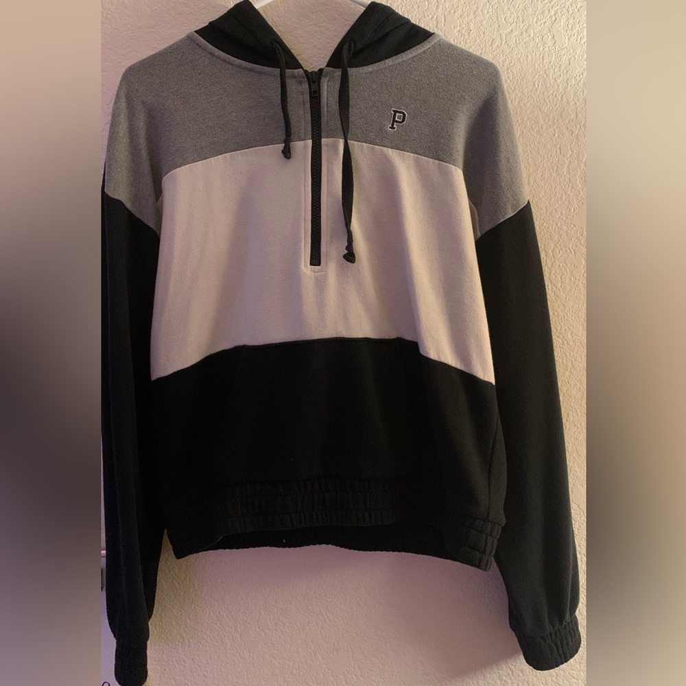 A striped Pink zip up hoodie